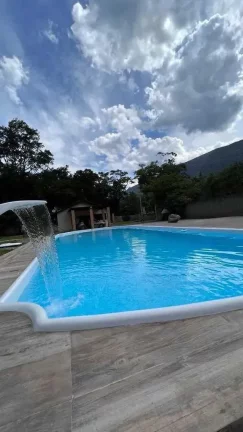 Imagem Chácara com casa de 3 dormitórios sendo 2 suítes e 8 vagas - Quiriri | Joinville/SC