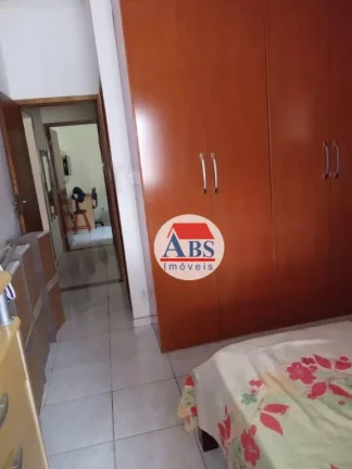 Imagem Sobrado com 3 dormitórios à venda, 208 m² por R$ 410.000,00 - Conjunto Afonso Schmidt - Cubatão/SP