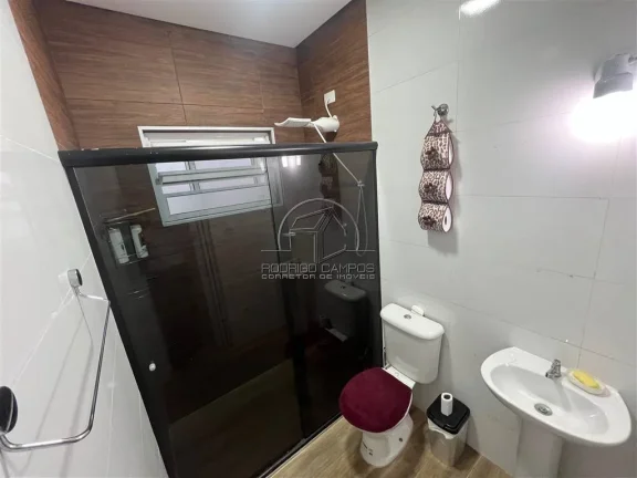 Imagem Casa Geminada Térrea com Piscina e 3 Quartos no Tupi, Praia Grande