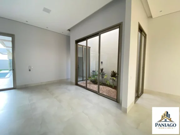 Imagem Casa de alto padrão com 3 suítes, cozinha gourmet e piscina com cascata