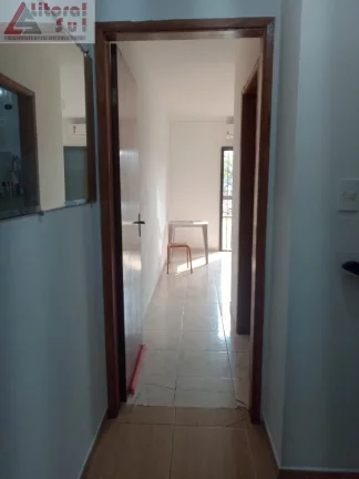 Imagem Casa à venda em Praia Grande-SP, bairro Maracanã: 2 quartos, 1 suíte, sala, 2 banheiros, 1 vaga e 75m² de área. Imperdível!