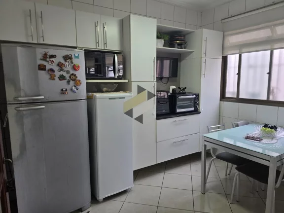 Imagem Sobrado Geminado para Venda em Santos, Embaré, 3 dormitórios, 1 suíte, 4 banheiros, 3 vagas