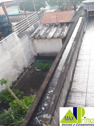 Imagem TERRENO COM 03 CASAS E 01 SALÃO COMERCIAL.