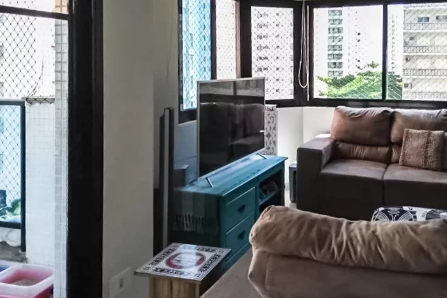 Imagem Flat com 3 dormitórios à venda, 112 m² por R$ 700.000,00 - Pitangueiras - Guarujá/SP
