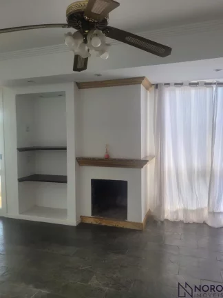 Imagem Amplo apartamento no centro de Santa Maria, sala para 02 ambientes com lareira e