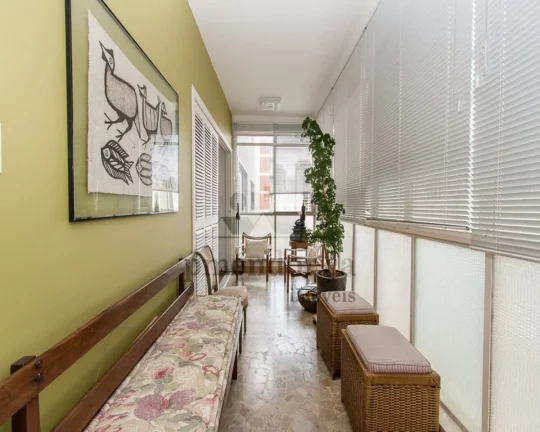 Imagem living para 2 ambientes integrado som a sala de jantar, lavabo, 3 dormitórios sendo 1