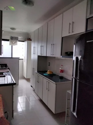 Imagem APARTAMENTO MOBILIADO Á VENDA, COM 2 QUARTOS, 84,00m2 - PÉ NA AREIA - VISTA PARA O MAR - PRAIA GRANDE/SP