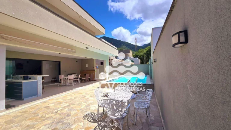 Imagem Casa com 4 dormitórios à venda, 205 m² por R$ 1.800.000,00 - Condomínio Capitanias - Ubatuba/SP
