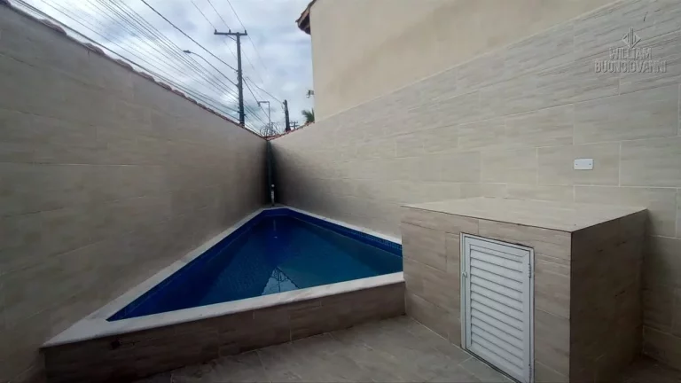 Imagem CASA DE ESQUINA COM PISCINA EM MONGAGUÁ LADO PRAIA !