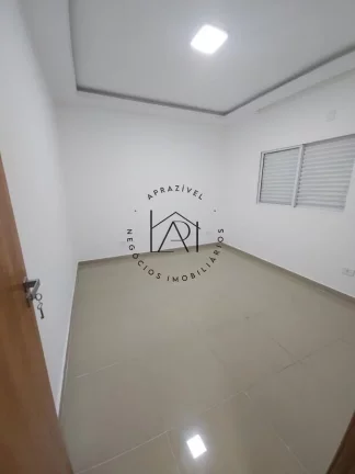 Imagem Casa para Venda em Praia Grande, Mirim, 2 dormitórios, 1 suíte, 3 banheiros, 3 vagas