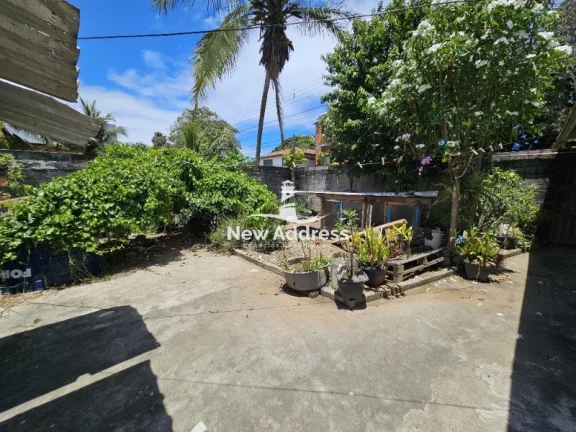 Imagem Casa 2 quartos à venda em Enseada de Jacaraípe, murada e gradeada, ideal para quem busca praticidade e quintal.