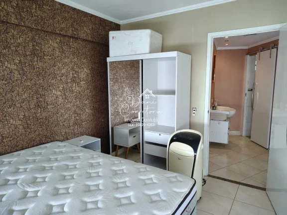 Imagem Apartamento com locação sem garantia frente mar Tombo com lazer: 2 salas, 2 banheiros, 1 vaga de garagem, 78m².