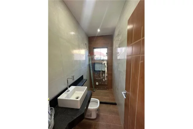 Imagem Uma casa belíssima em uma localização espetacular PRÓXIMO A PRAIA