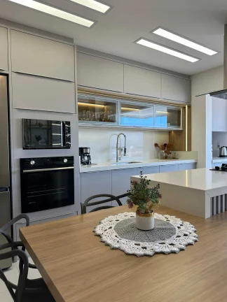 Imagem Apartamento mobiliado com 3 dormitórios e 2 vagas de garagem em Navegantes/SC