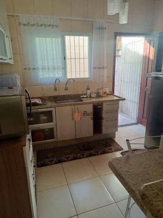 Imagem Sobrado com 2 dormitórios à venda, 79 m² por R$ 318.000 - Oceanópolis - Mongaguá/SP
