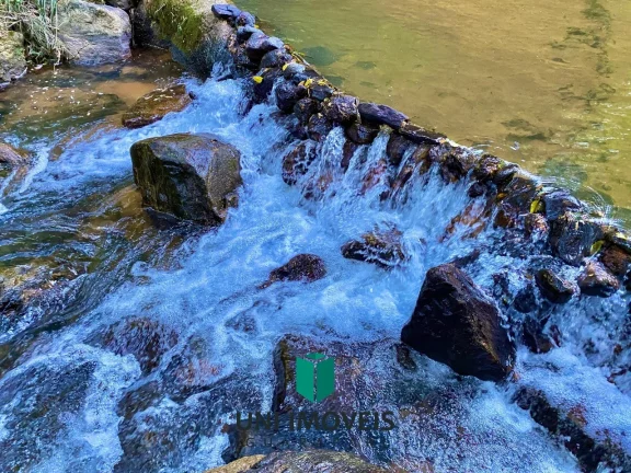 Imagem Chácara com 10 suítes e Cachoeira a venda, 9.104M² na zona rural de Guarapari.