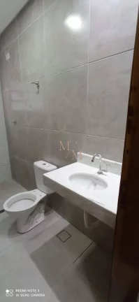 Imagem Casa sobreposta baixa NOVA a venda com 2 dormitórios, garagem, quintal.