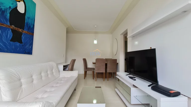 Imagem Vende um aconchegante apartamento de 51m², com dois dormitórios sendo uma suíte, uma vaga coberta
