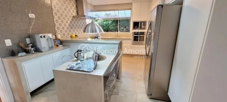 Imagem Casa de condomínio com 343 m² e 4 quartos