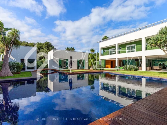 Imagem Mansão contemporânea com heliponto particular à venda no condomínio Jardim Acapulco no Guarujá