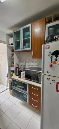Imagem Apartamento com 47 M², 2 dormitórios, 1 banheiro, sala, cozinha, área de serviços e 1 vaga de ga...