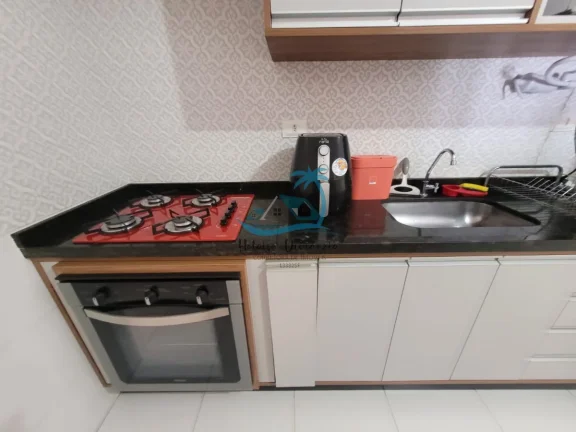 Imagem Apartamento mobiliado com 2 dormitórios e varanda gourmet a venda a 400 metros da orla de Itaguá em Ubatuba.