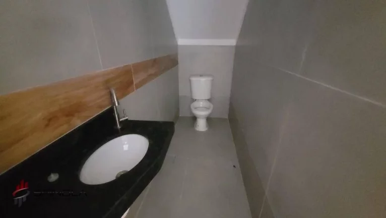 Imagem Sobrado com 2 dormitórios à venda, 57 m² por R$ 350.000,00 - Maracanã - Praia Grande/SP