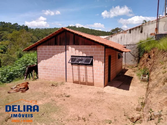 Imagem Chácara em Terra Preta em bairro tranquilo de 1.100m² à venda.