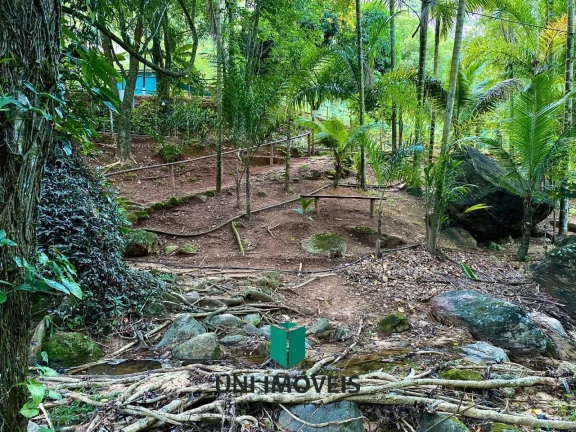 Imagem Chácara com 10 suítes e Cachoeira a venda, 9.104M² na zona rural de Guarapari.
