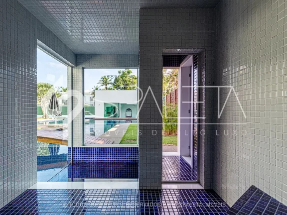Imagem Mansão contemporânea com heliponto particular à venda no condomínio Jardim Acapulco no Guarujá