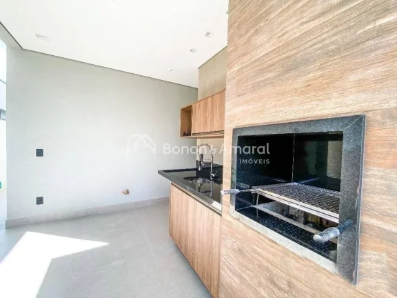 Imagem Casa térrea com 3 suítes, cozinha americana integrada às salas de estar e jantar, e área gourmet...