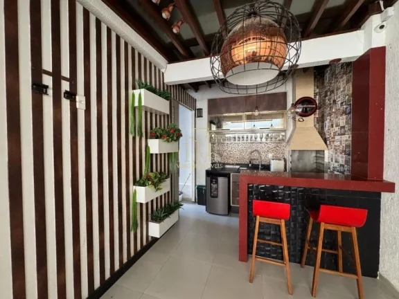 Imagem Excelente casa em condomínio fechado com três suítes espaço gourmet a venda em Buraquinho