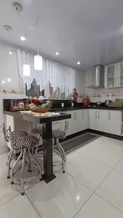 Imagem CASA DE ESQUINA COM 3 QUARTOS NO ITAUM