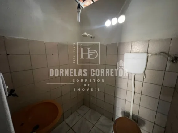 Imagem TERRENO COM 2 CASAS, 2 QUARTOS, 1 WC, ÁREA DE SERVIÇO E QUINTAL