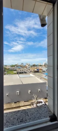 Imagem Imperdível apartamento à venda em Macaé-RJ, Riviera Fluminense! 2 quartos, 1 suíte, 2 salas, 3 banheiros, 2 vagas de garagem. Confira!