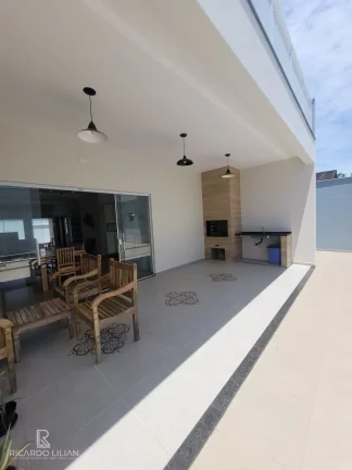 Imagem "Seu Refúgio à Beira-Mar: Sobrado de Luxo com Piscina, Automação e 5 Vagas no Cibratel 1, Itanhaém!"