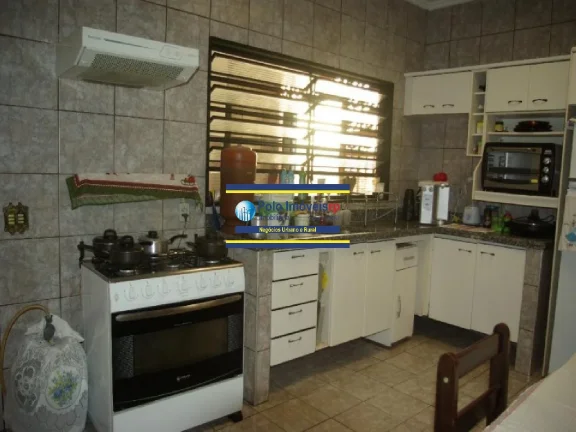 Imagem Casa bairro Campos Eliseos vende, R$ 450.000 com 3 dormitórios (1 suíte), 2 vagas, piscina - Ribeirão Preto - SP