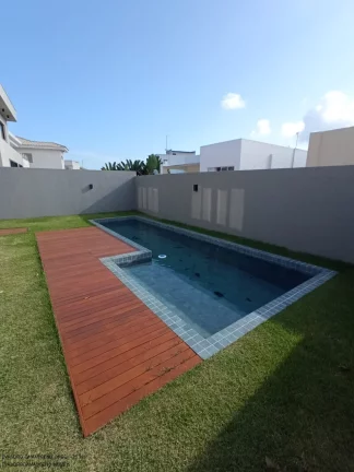 Imagem Imperdível: Casa de luxo em condomínio Alphaville, 4 quartos, 4 suítes, 2 salas, 4 vagas em Camaçari-BA