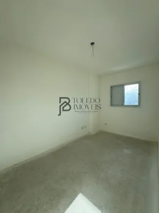 Imagem Apartamento de 2 dormitórios sendo 1 suíte, prédio frente mar no bairro Vila Mirim - Praia Grande