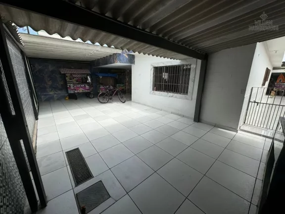 Imagem asa térrea 5 dormitórios sendo 1suíte no Bairro Imperador