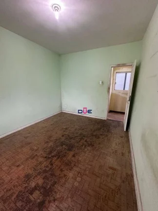 Imagem Sobrado com 2 dormitórios à venda, 98 m² por R$ 393.000 - Macuco - Santos/SP