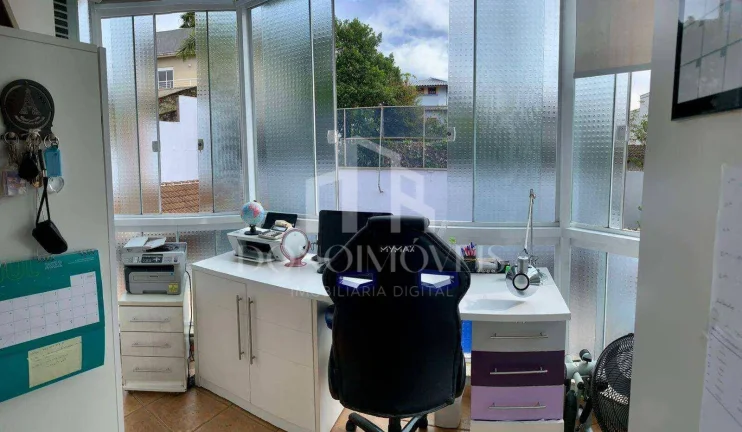 Imagem Casa alto padrão 318m² | 4 suítes | Piscina aquecida | 7 vagas | Swiss Park