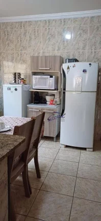 Imagem Casa com 3 dormitórios à venda, 114 m² por R$ 495.000 - Maracanã - Praia Grande/SP