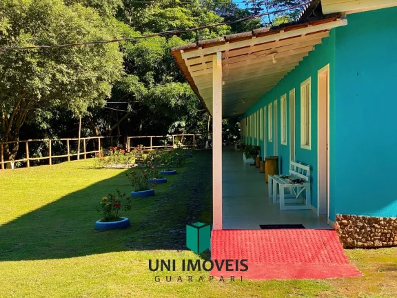 Imagem Chácara com 10 suítes e Cachoeira a venda, 9.104M² na zona rural de Guarapari.