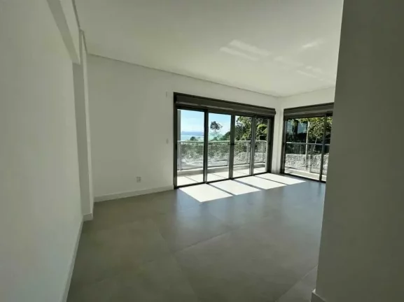 Imagem Apartamento com 3 dormitórios sendo 3 suítes e 4 vagas no bairro Cacupé em Florianópolis/SC