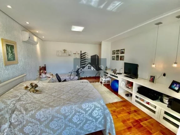 Imagem Casa com 607m² de área construída em terreno de 3,087m².