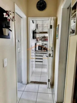 Imagem Apartamento 2 dormitórios, sala, cozinha com armários, área de serviço,1 vaga de garagem. 50m²....