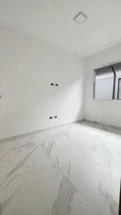 Imagem Casa com 2 dormitórios à venda, 54 m² por R$ 295.000,00 - Maracanã - Praia Grande/SP