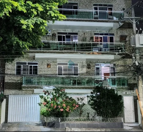 Imagem Imperdível oportunidade de investimento em Vila Valqueire: Apartamento de 4 quartos com suíte e 2 vagas de garagem no RJ