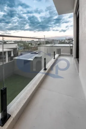 Imagem Casa a venda com 3 dormitorios no Morada das Palmeiras em Torres/RS